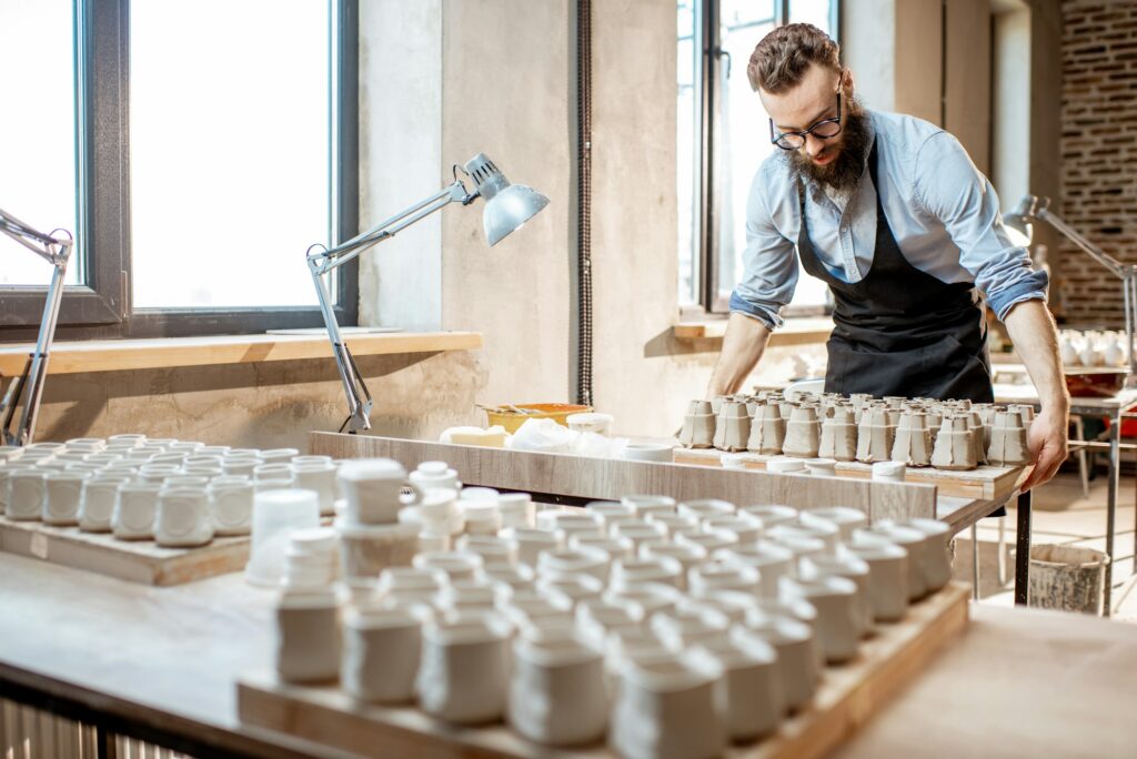 Man working with ceramics at the pottery